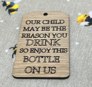 Bottle tag our child may be