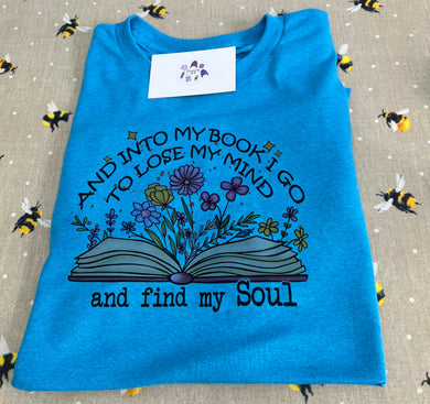 And into my books I go tshirt